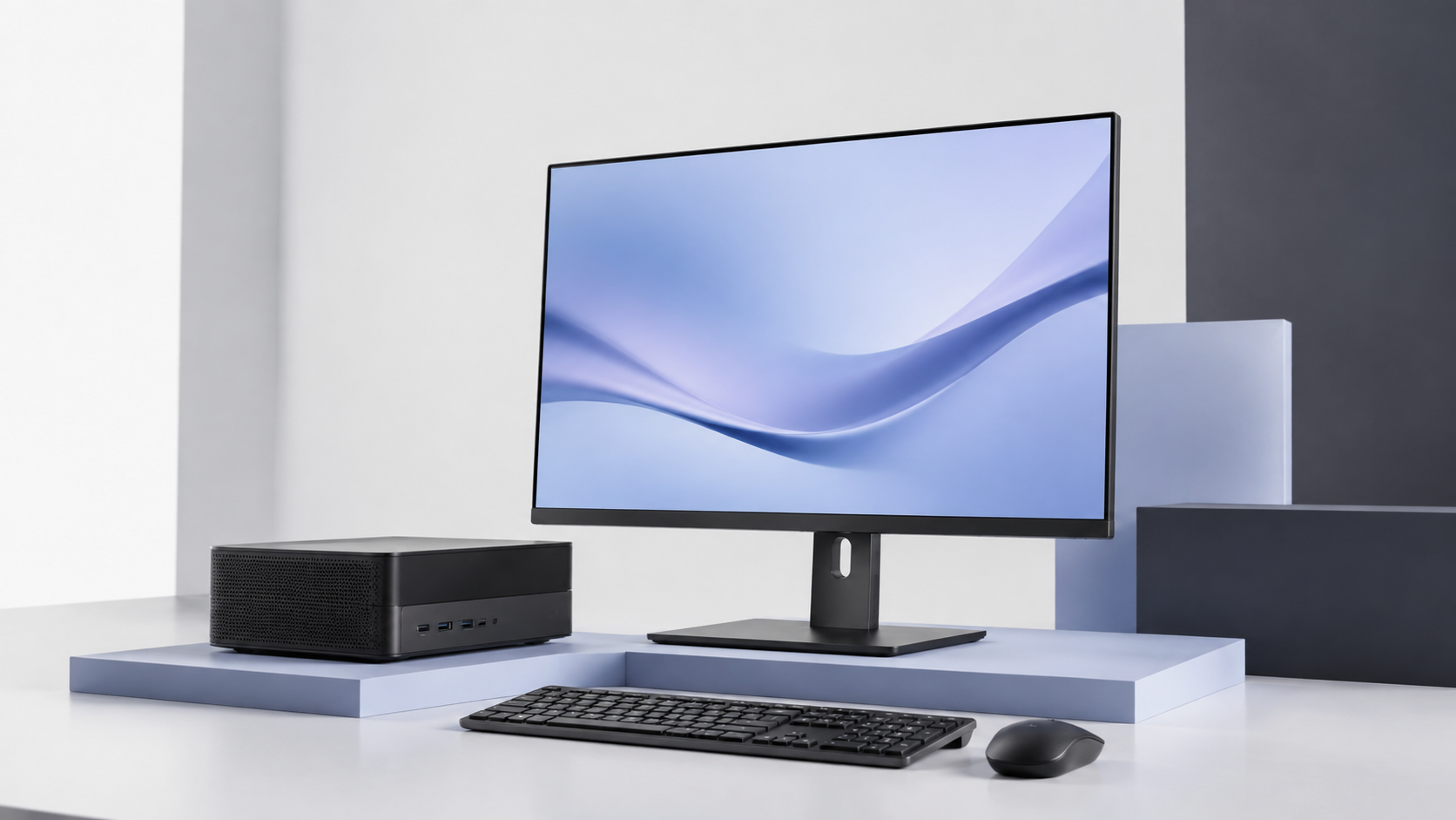 A compact mini desktop computer and 27-inch monitor arranged in a white and periwinkle studio